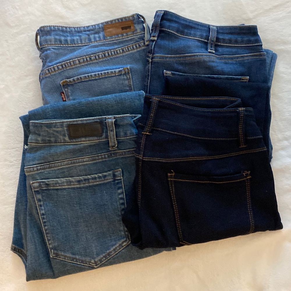 4 pairs size 30 blue jeans.